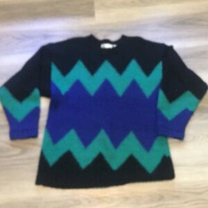 Black Sweater with Green and Blue Zigzag Pattern